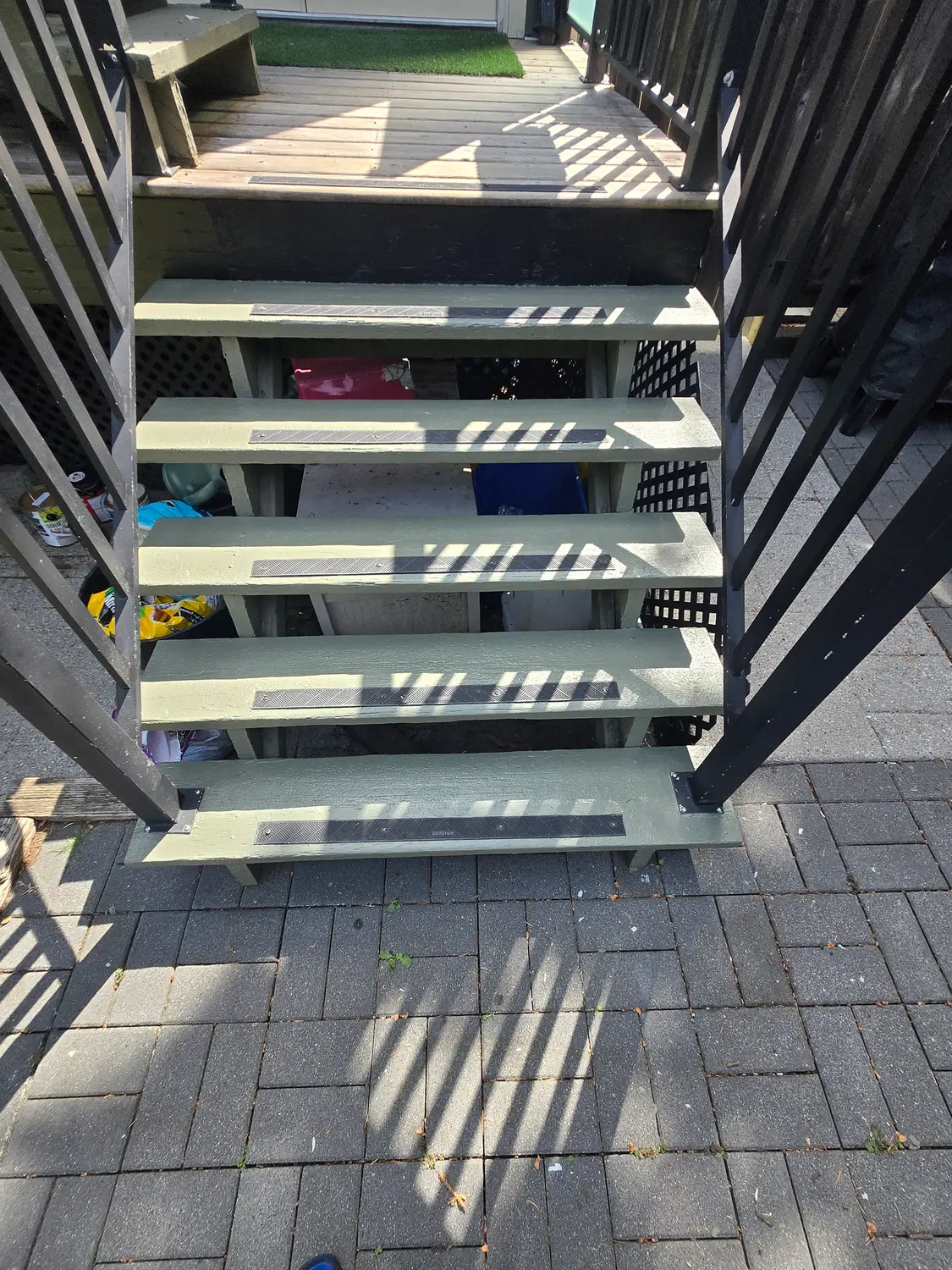 Back deck stairs repainted in sage green