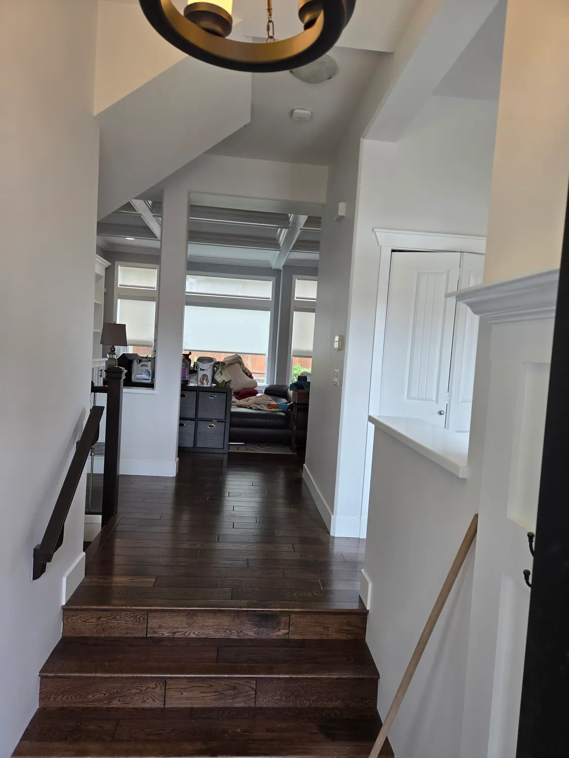 Freshly painted hallway and stairs in warm white